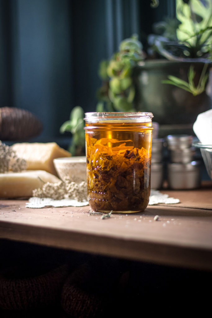 herbal oil steeping in jar