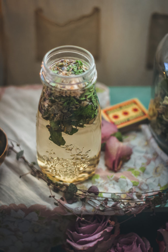 skullcap lavender rose tea steeping in glass jar