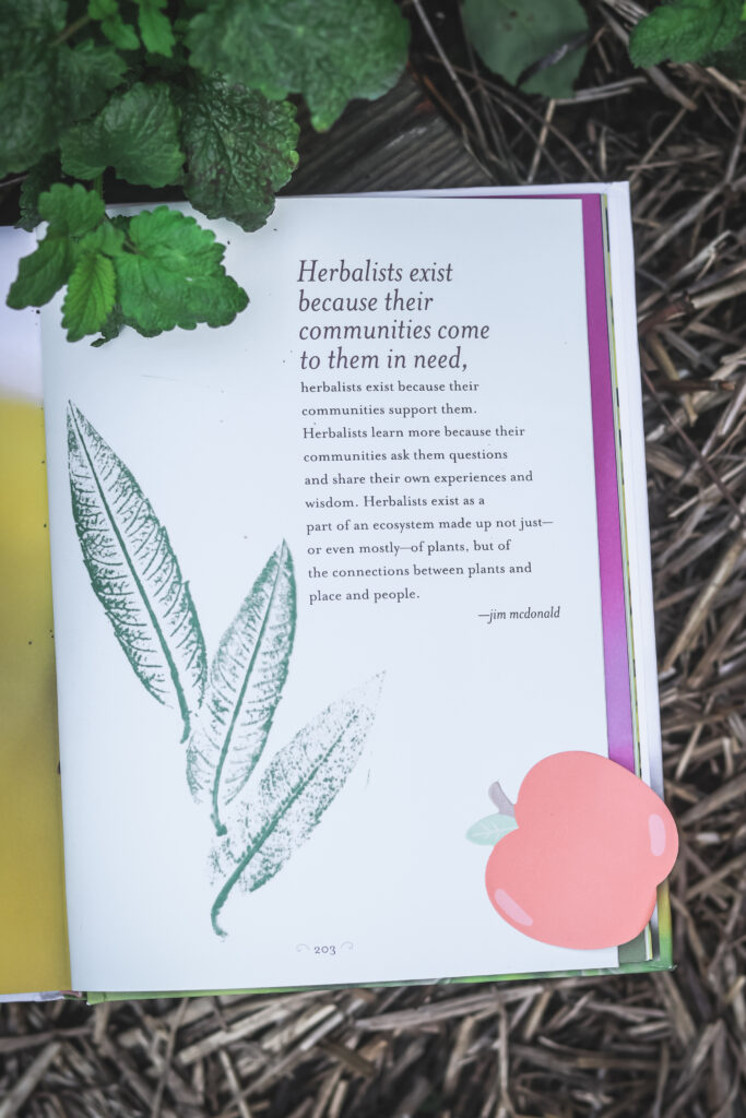 page open in a book to a quote about herbalism